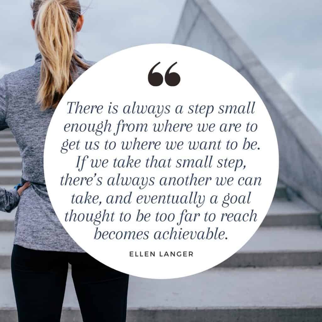 A woman in grey athletic wear standing at the base of grey concrete stairs with an overlay of an Ellen Langer quote.