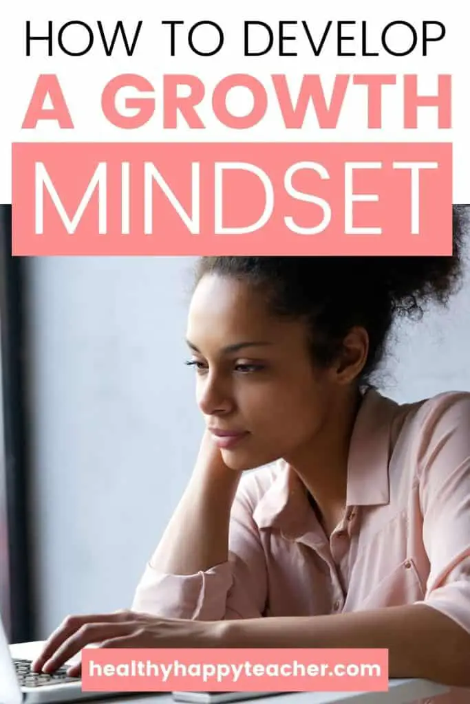 A woman looking intently at a computer with the text overlay How to develop a growth mindset
