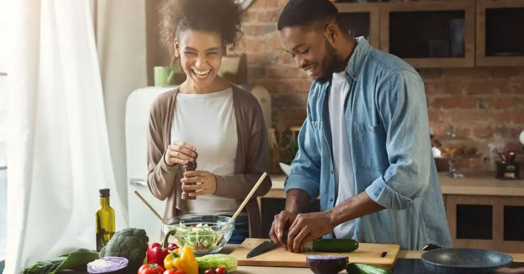 Couple cooking healthy food